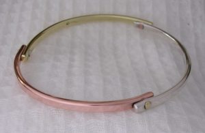 tri-metal bangle bracelet